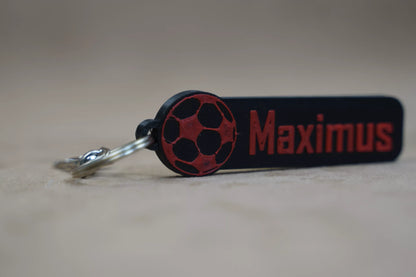 Personalised football keychain with the name Maximus and a soccer ball design, ideal for football fans.