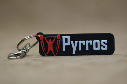 Personalised weightlifting keychain with the name Pyrros, showcasing a fitness design for gym enthusiasts.