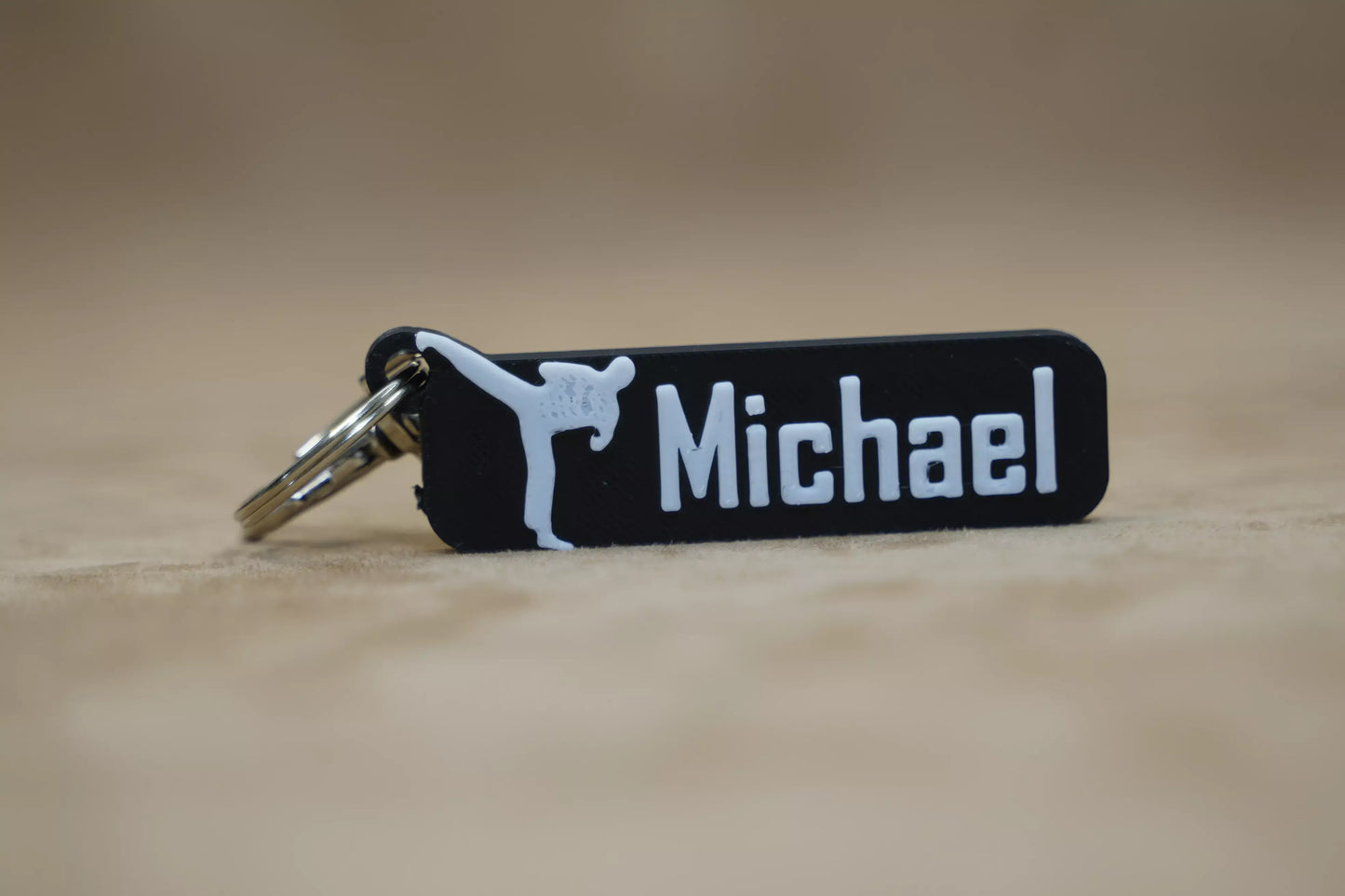 Personalised Karatey Figure Keychain with the name "Michael" in a stylish design. Ideal for karate enthusiasts.