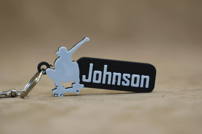 Personalised Skater Keychain featuring a skateboarding figure and name "Johnson" for stylish key organization.