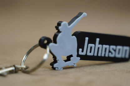 Personalised skater keychain featuring the name Johnson, perfect for skateboard enthusiasts to showcase their style.