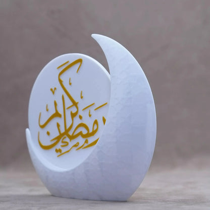 Elegant Ramadan decor featuring a crescent moon design with "Ramadan" in gold calligraphy, ideal for festive table settings.